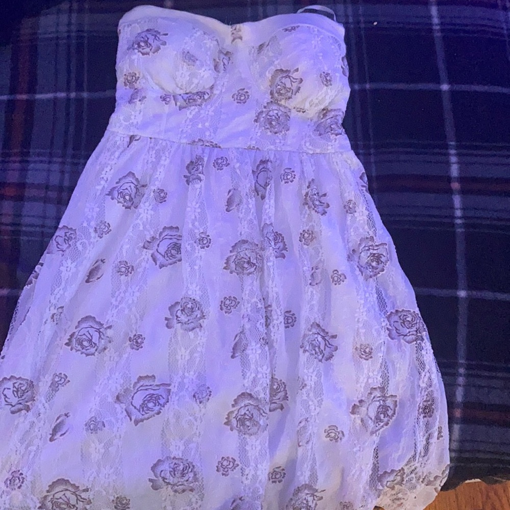 Size- S , color -white with flowers